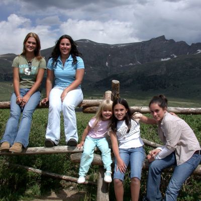 AU09  Girl On Guanella Pass Fence